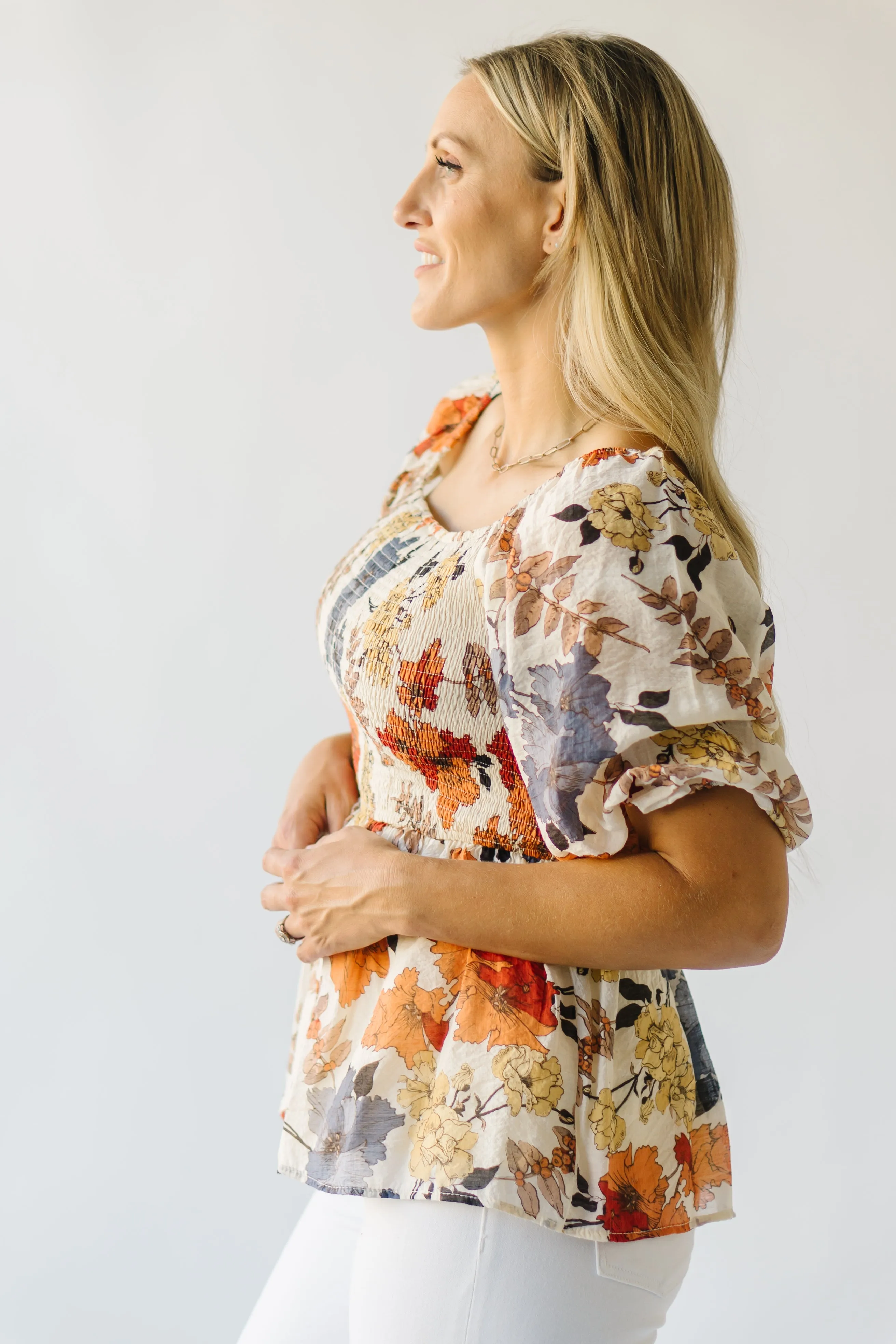 The Ashbelle Smocked Peplum in Rust Multi