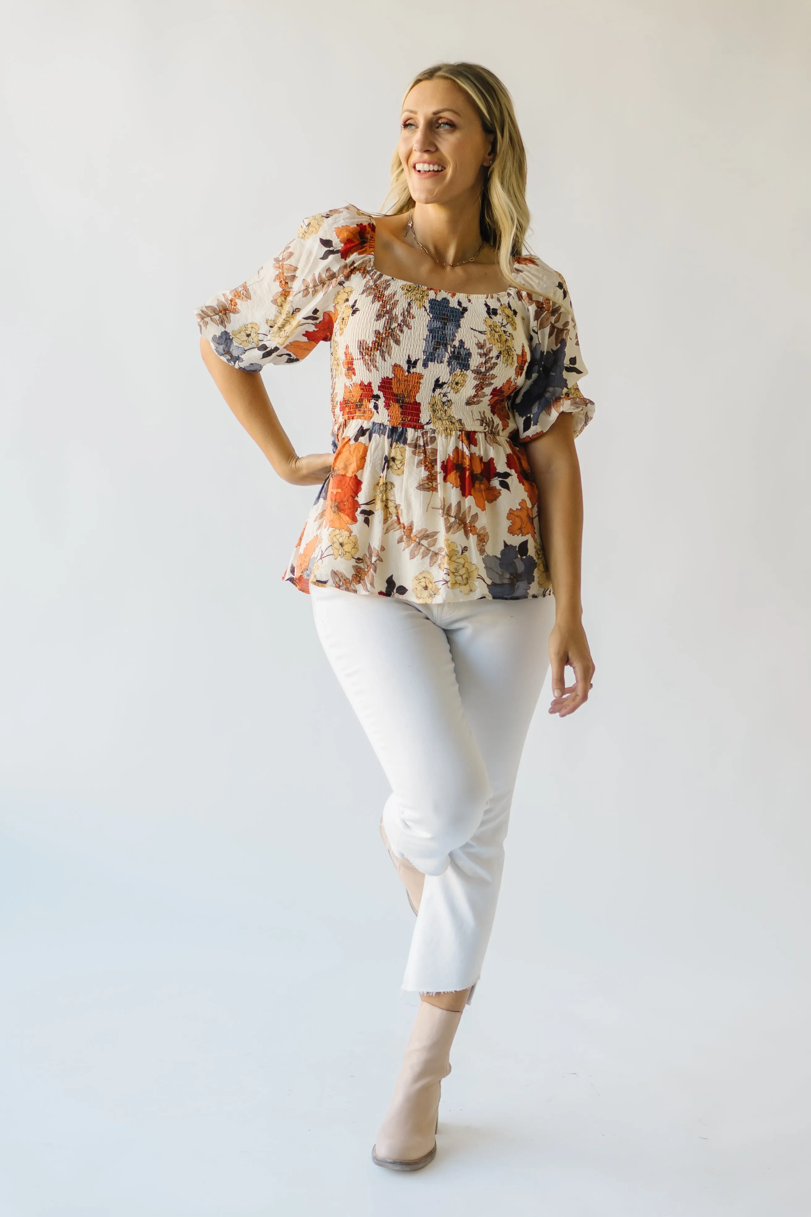 The Ashbelle Smocked Peplum in Rust Multi